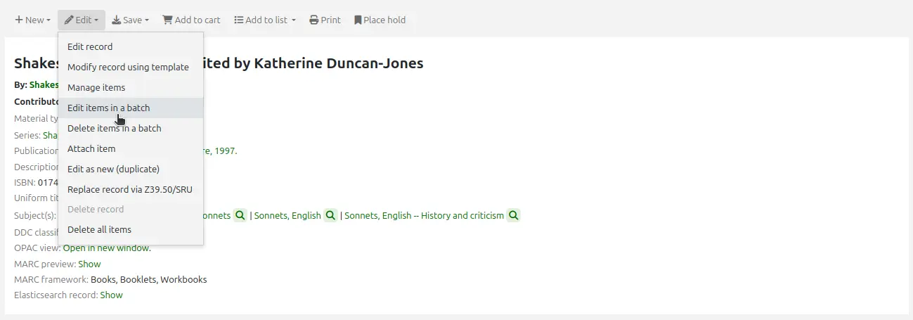 The Edit menu in a bibliographic record, the mouse cursor is on the 'Edit items in a batch' option